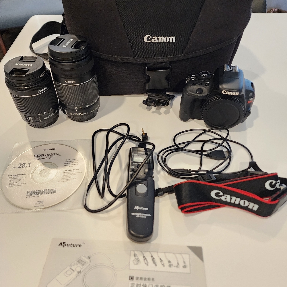 Canon Rebel SL1 DSLR Kit + 18–55 + 55–250 + Bag + Tripod + Extras